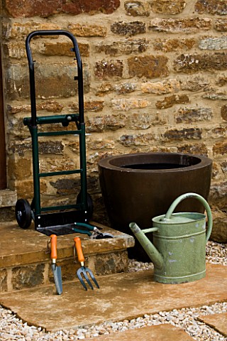 TOOLS_FOR_CONTAINER_GARDENING__WATERING_CAN__TROWEL_SECATEURS_AND_TROLLEY