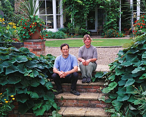 HALL_FARM__LINCOLNSHIRE_PAM_AND_MARK_TATAM_ON_THE_STEPS_IN_FRONT_OF_THE_HOUSE