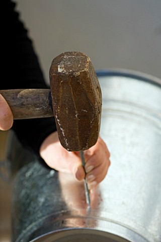 BARBEQUE_PROJECT_CLARE_MATTHEWS_HAMMMERS_NAIL_THROUGH_METAL_BUCKET