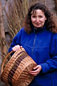 WINDRUSH WILLOW: SUZANNE KERWOOD WITH ONE OF HER WILLOW BASKETS
