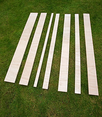 DESIGNER_CLARE_MATTHEWS__WALL_ART_PROJECT__STRIPS_OF_PLYWOOD_LAID_OUT_READY_FOR_PAINTING