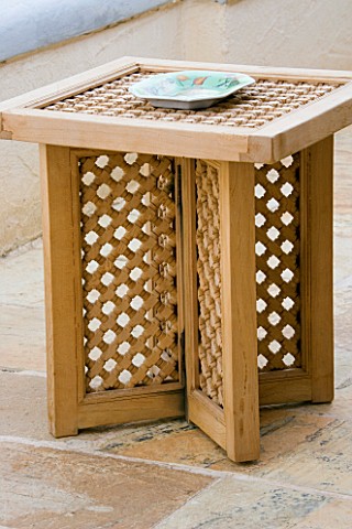 LATTICED_WOODED_TABLE_ON_PATIO_IN_GINA_PRICES_CORFU_GARDEN