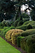 BRODSWORTH HALL  YORKSHIRE. ENGLISH HERITAGE. EVERGREEN TOPIARY BORDERS AND STATUE