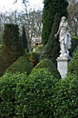 BRODSWORTH HALL  YORKSHIRE. ENGLISH HERITAGE. EVERGREEN TOPIARY BORDERS AND STATUE
