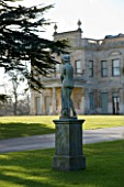 BRODSWORTH HALL  YORKSHIRE. ENGLISH HERITAGE. STATUE WITH CEDAR TREE AND HALL FRONT