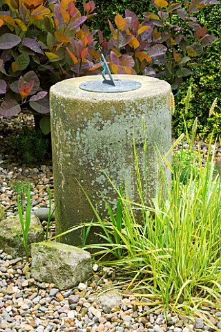 HUNMANBY_GRANGE__YORKSHIRE_SUNDIAL_FROM_GRANDMOTHERS_GARDEN_WITH_GOLDEN_VARIEGATED_GOLDEN_FOXTAIL_GR