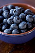 BLUEBERRIES IN A BLUE BOWL. ORGANIC  NATURAL  HEALTHY  PATTERN. ANTI OXIDANT