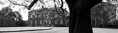 KELMARSH_HALL__NORTHAMPTONSHIRE_BLACK_AND_WHITE_IMAGE_OF_THE_FRONT_OF_THE_HALL