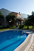 CORFU  GREECE. MALAMA HOUSE NEAR BARBATI. VIEW TO THE HOUSE WITH SWIMMING POOL IN THE FOREGROUND