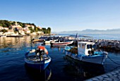 CORFU  GREECE: VIEW OF KASSIOPI IN THE NORTH EAST OF CORFU WITH FISHING BOATS