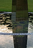 OBELISK SUNDIAL REFLECTED IN WATER BY DAVID HARBER SUNDIALS