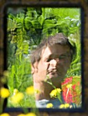 PROVENCE  FRANCE. GARDEN OF MARCO NUCERA. MARCO NUCERA REFLECTED IN A MIRROR