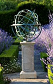 DAVID HARBER SUNDIALS: ARMILLARY SPHERE SUNDIAL ON PATH IN FORMAL GARDEN WITH PEROVSKIA AND CLIPPED BOX HEDGING