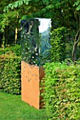 DAVID HARBER SUNDIALS: TITAN SCULPTURE MADE FROM RUSTIC OXIDISED STEEL AND MIRROR POLISHED STAINLESS STEEL