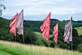 THROUGHAM COURT  GLOUCESTERSHIRE. DESIGNER: CHRISTINE FACER: BANNERS BY SHONA WATT IN THE WILD GRASS MEADOW