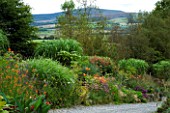 HUNTING BROOK  CO WICKLOW  REPUBLIC OF IRELAND: DESIGNER JIMI BLAKE - VIEW ALONG THE MAIN BORDER WITH THE WICKLOW MOUNTAINS BEHIND