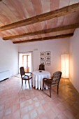 SON BERNADINET HOTEL  NEAR CAMPOS  MALLORCA. SUITE.DO. THE DINING ROOM WITH TABLE AND CHAIRS