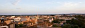 SUITE.DO. DAWN SUNRISE OVER ROOFTOPS AT SES SALINAS  MALLORCA  SPAIN