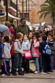 THE VEGETABLE MARKET  SANTANYI  MALLORCA  SPAIN. SCHOOL CHILDREN
