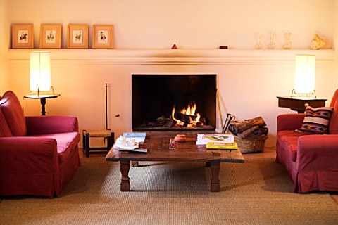 SON_BERNADINET_HOTEL__NEAR_CAMPOS__MALLORCA__SPAIN_ONE_OF_THE_LIVING_ROOMS_WITH_A_FIREPLACE