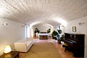 SON BERNADINET HOTEL  NEAR CAMPOS  MALLORCA. SUITE.DO. BEAUTIFUL WHITE SITTING ROOM WITH PIANO