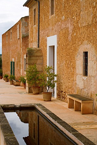 SON_BERNADINET_HOTEL__NEAR_CAMPOS__MALLORCA_SUITEDO_A_WATER_CONTAINER_BESIDE_THE_HOTEL_ENTRANCE_IN_T