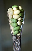 BOONSHILL FARM AT CHRISTMAS: THE DINING ROOM - GLASS HOLDER WITH SUGARED ALMONDS. DESIGNER: LISETTE PLEASANCE