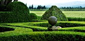 PROVENCE  FRANCE - ALTAVES. BOX TOPIARY GARDEN WITH ORNAMENTAL STONE FEATURES