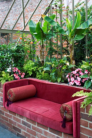 THE_WALLED_GARDEN_AT_COWDRAY__WEST_SUSSEX_DESIGNER_JAN_HOWARD__INSIDE_THE_CONSERVATORYGREENHOUSE_WIT