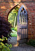 WOLLERTON OLD HALL  SHROPSHIRE: BEAUTIFUL GOTHIC STYLE WOODEN GATE LEADING TO THE YEW WALK
