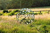 DAVID HARBER SUNDIALS: THE NUAGE - BRONZE SPHERE IN THE MEADOW AT PETTIFERS  OXFORDSHIRE
