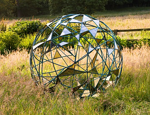 DAVID_HARBER_SUNDIALS_THE_NUAGE__BRONZE_SPHERE_SCULPTURE_IN_THE_MEADOW_AT_PETTIFERS__OXFORDSHIRE