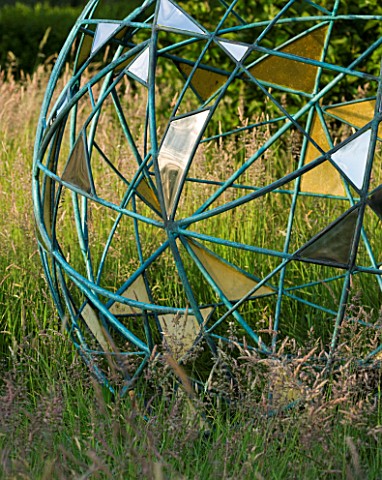 DAVID_HARBER_SUNDIALS_THE_NUAGE__BRONZE_SPHERE_IN_THE_MEADOW_AT_PETTIFERS__OXFORDSHIRE__DETAIL_OF_GO