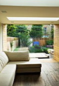 GARDEN DESIGNER: CHARLOTTE ROWE  LONDON: VIEW FROM LIVING AREA OUT ONTO FORMAL TOWN/CITY GARDEN