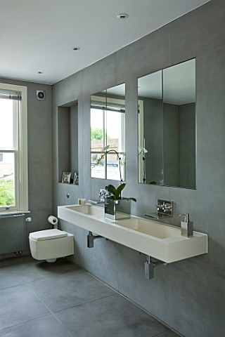TANIA_LAURIE__LONDON_WALL_MOUNTED_DOUBLE_STONE_SINK_IN_GREY_SLATE_TILED_BATHROOM_WITH_MIRRORS