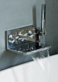 TANIA LAURIE  LONDON. STYLISH  CONTEMPORARY WALL MOUNTED CHROME TAP