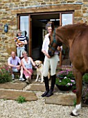 CLIVE  JANE  HAZEL AND ROBERT AT RICKYARD BARN  WITH CHICKEN  MURPHY THE DOG AND FINN THE HORSE