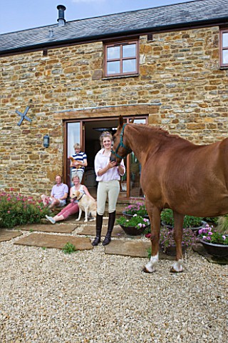 CLIVE__JANE__HAZEL_AND_ROBERT_AT_RICKYARD_BARN__WITH_CHICKEN__MURPHY_THE_DOG_AND_FINN_THE_HORSE