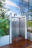 CONTEMPORARY FORMAL ROOF TERRACE/ GARDEN DESIGNED BY DATA NATURE ASSOCIATES: MODERN METAL SHOWER WITH METAL BEAD SCREEN