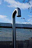CONTEMPORARY FORMAL ROOF TERRACE/ GARDEN DESIGNED BY DATA NATURE ASSOCIATES: MODERN METAL SHOWER LIT AT NIGHT WITH METAL BEAD SCREEN