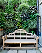 ARCHITECT CHRIS DYSONS HOUSE: SEAT IN FRONT OF THE GREEN LIVING WALL