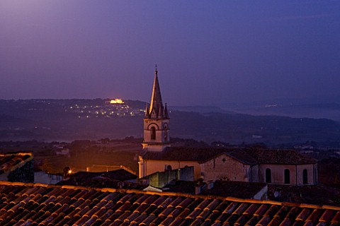 PROVENCE__FRANCE_BONNIEUX_CHURCH_IN_M_OONLIGHT_WITH_LACOSTE_BEYOND