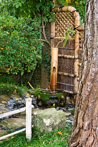 GARDEN_OF_ERIK_BORJA__FRANCE_JAPANESE_ASIAN_STYLE__BAMBOO_WATER_FEATURE_WITH_PURIFICATION_STONE_AND_