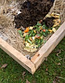DESIGNER CLARE MATTHEWS: POTAGER PROJECT - DEEP BED MULCHING - COMPOST LAID OVER HOUSEHOLD FOOD WASTE LAID OVER NEWSPAPER AND GARDEN WASTE