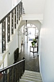 DESIGNER: JOHN MINSHAW - THE HALLWAY SEEN FROM THE STAIRCASE