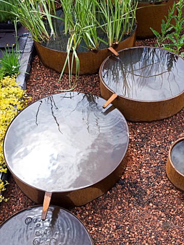 CHELSEA_FLOWER_SHOW_2009_FUTURE_NATURE_GARDEN_BY_ARK_DESIGN_MANAGEMENT_LTD_COPPER_POOLSWATER_BUTTS_T