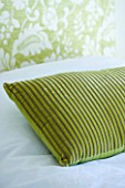 DESIGNER: CLAIRE SKINNER  ROU ESTATE  CORFU: HOUSE INTERIOR - BEDROOM WITH GREEN CUSHION AND HEADBOARD