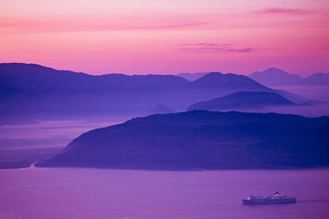 THE_ROU_ESTATE__CORFU_VIEW_ACROSS_TO_ALABANIAN_MOUNTAINS_AT_DAWN_WITH_CRUISE_SHIP
