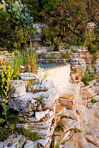 THE_ROU_ESTATE__CORFU_THE_SWIMMING_POOL_AREA__ROCK_FACE_BESIDE_THE_PLUNGE_POOL
