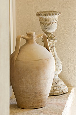 THE_ROU_ESTATE__CORFU_INTERIOR_DETAIL_OF_STONE_URN_AND_CANDLESTICK